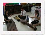 DSCN0209 * the music teacher is playing the Saw Duang and the student is playing the Saw U -- note the Saw U has a coconut shell. * 2592 x 1944 * (1.05MB)