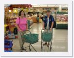 DSCN0294 * Two shoppers in a super market in Japan with their typical shopping carts. * 2592 x 1944 * (1016KB)