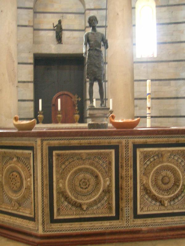 DSCN1754.JPG - This octagonal font at the center is from 1246, with a bronze scupture of St. John the Baptist at the center