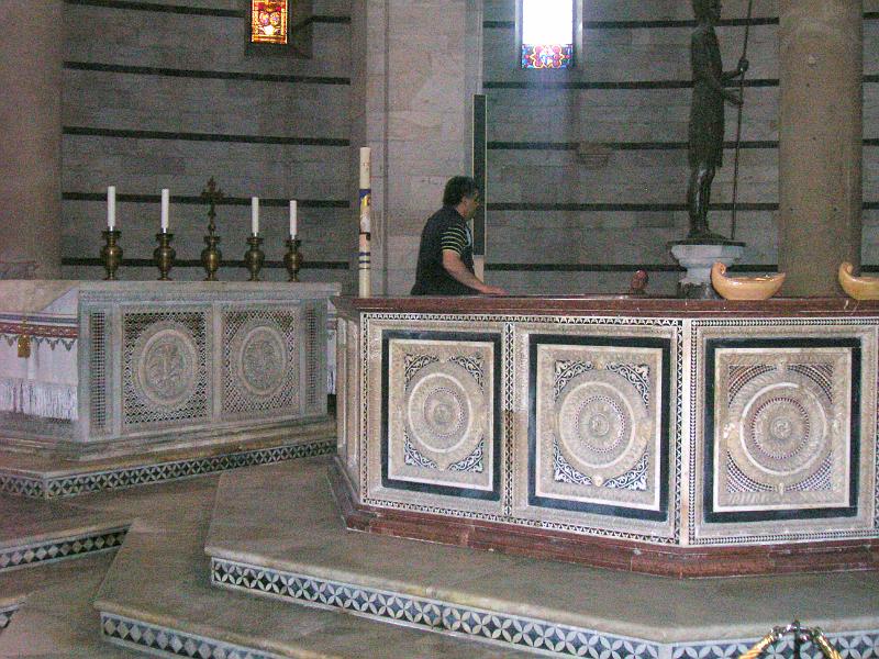 DSCN1756.JPG - During our visit, the man shown here came to the center of the baptistry and sang the notes of several major chords. The resonance is so long (12-13 seconds) that all the notes of the chords could be heard simultaneously